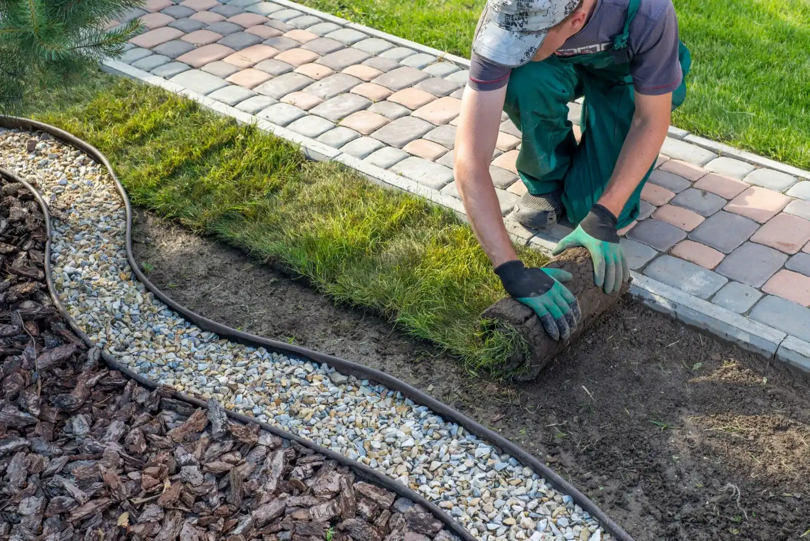Landscaping contractor working on a lawn.