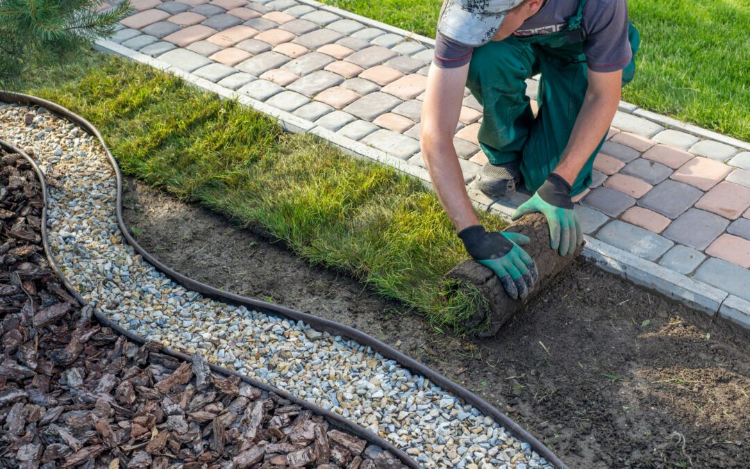 Landscaping contractor working on a lawn.