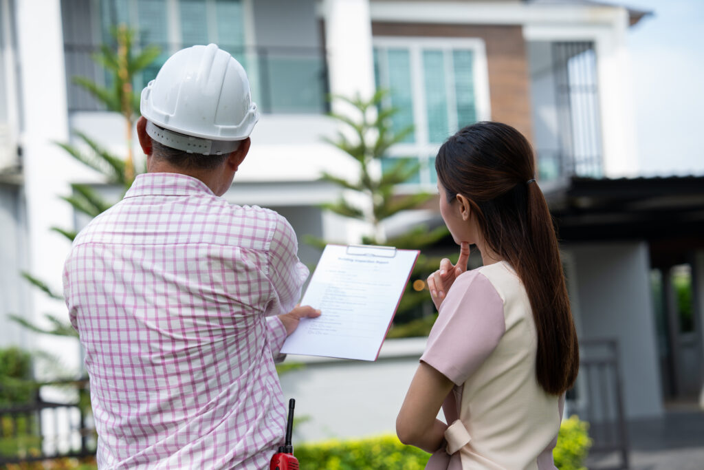 Contractor explains Inspection results with client.