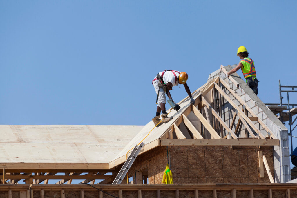 Workers are working on the roof